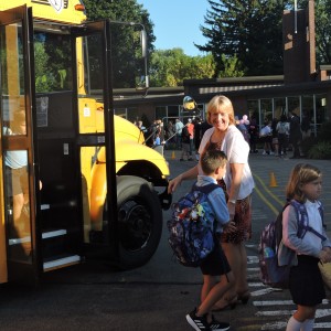 Mrs. Wagner greeted the students as they got off the buses.